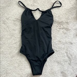 Black one piece swimsuit. Never worn. Size M (8-10)